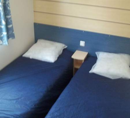 2 chambres avec 2 lits simples